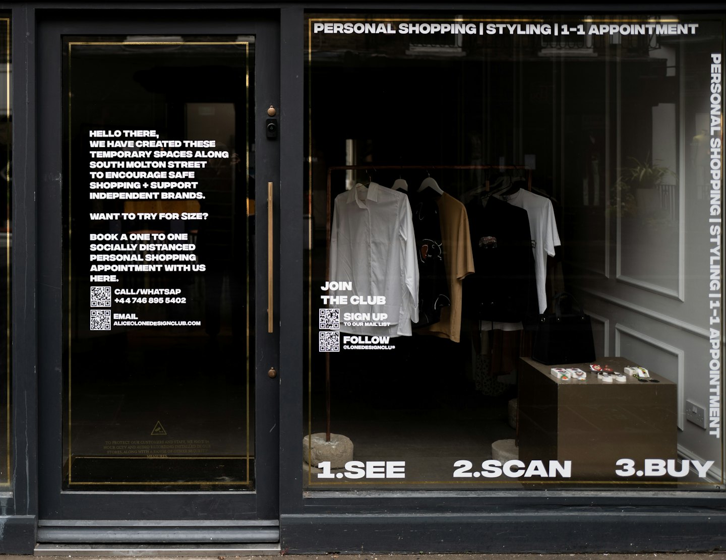 Storefront windows advertising personal shopping and styling appointments.